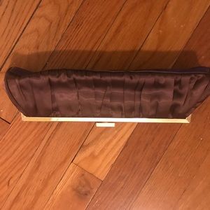 Sleek brown and gold clutch for a night out